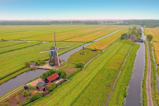 Aerial from a traditoinal windmill in the countryside from the Netherlands