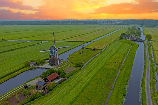 Aerial from a traditoinal windmill in the countryside from the Netherlands