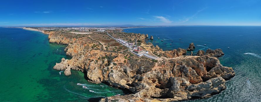 Aerial panorama from Ponte Piedade with the lighthouse in Lagos Portugal