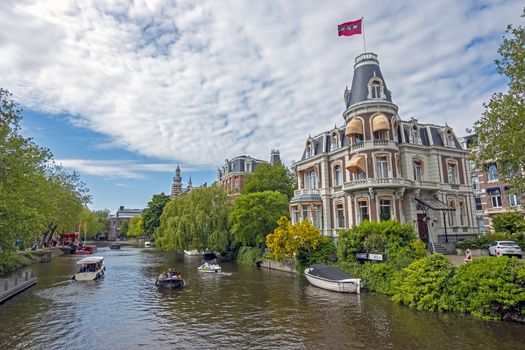 Amsterdam, Netherlands - May 16, 2019: Dutch house with the Amsterdam flag honoring the national championship from Ajax in Amsterdam the Netherlands