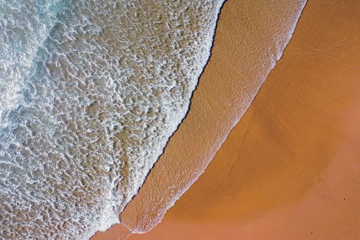 Aerial from the beach at the atlantic ocean in Portugal