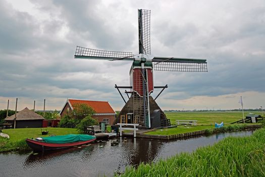 Traditional windmill in the countryside from the Netherlands