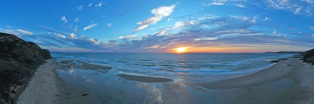 Panorama from Praia Vale Figueiras in Portugal at sunset