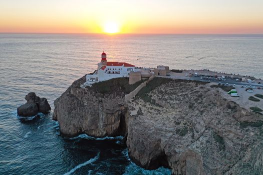 Aerial from the lighthouse Cabo Vicente near Sagres in Portugal at sunset
