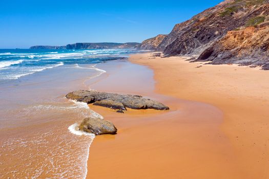 Aerial from natural rocks on Vale Figueiras beach in Portugal