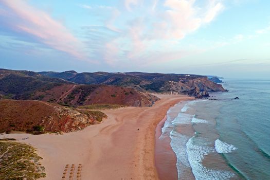 Aerial on Praia Amado on the west coast in Portugal at sunset