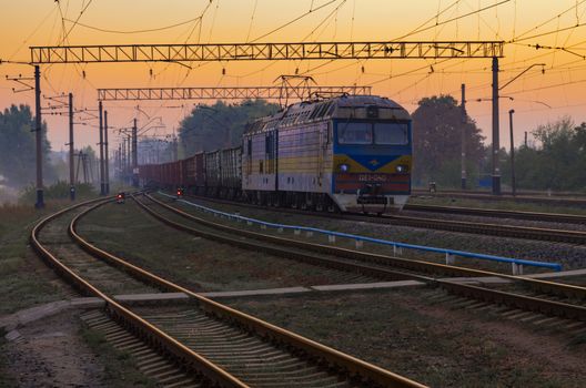 Slavyansk, Ukraine - september 13 2018:cargo train arrives on sunrise in Slavyansk