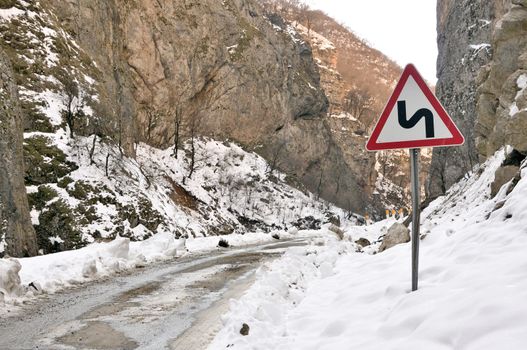 Road signs warn drivers of vehicles and regulate their movement.