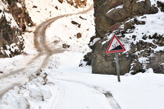 Road signs warn drivers of vehicles and regulate their movement.