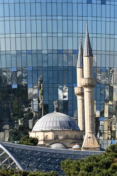 The mosque with two minarets is built next to Alley of Martyrs
