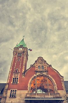 Old train station of Alsace touristic city Colmar with dramatic filter 