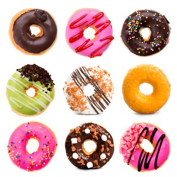 various doughnuts on white background