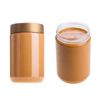 Jar of peanut butter on a white background