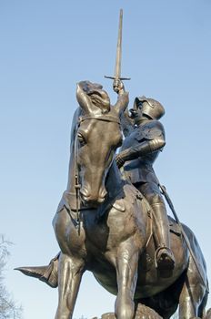 Statue of St George on horseback, part of the Cavalry Monument in Hyde Park, London. Sculpted by Adrian Jones, made from melted enemy guns and on public display since 1921. Monument to Cavalry soldiers killed in World War 1.  
