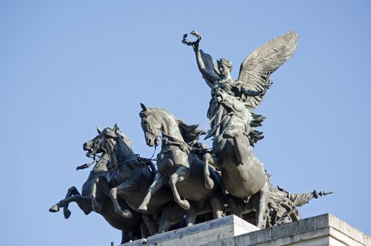 Quadriga statue of winged victory riding a four horse chariot on top of the landmark Wellington Arch, also known as Constitution Arch. Sculpted by Adrian Jones and on public display at Hyde Park Corner since 1912.