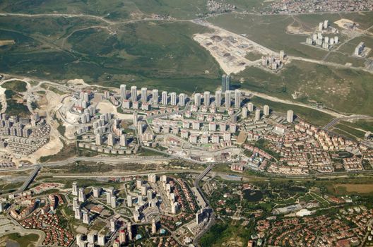 Aerial view of some new high rise housing developments on the Western outskirts of Istanbul.  The Mesa Nurol Bahçeşehir Evler area includes a number of towerblocks of apartments. 