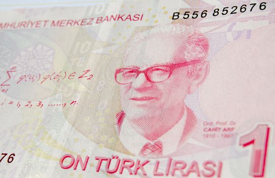 Famous mathematician Professor Dr Cahit Arf on a ten Lira banknote in circulation in Turkey.  He is famous for work leading to knot theory and surgery theory.  Used banknote, photographed at an angle.