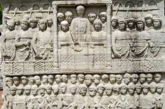 Stone frieze sculpture of the Byzantine Emperor Theodosius showing him in a crowd watching a race at the hippodrome in Istanbul, Turkey.