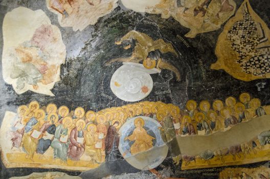 The Last Judgement scene.  Medieval Byzantine fresco on the ceiling of the Chora Church in Istanbul, Turkey.  Jesus Christ sits with Mary and John the Baptist with Apostles and angels surrounding them.  Paradise is represented by a snail shell carried by an angel.