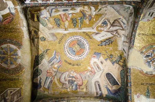 Medieval Byzantine mosaic covering part of the domed ceiling of an historic church showing scenes from the life of St Mary including her as a baby being cared for by parents Joachim and Anne.   Chora Church, Istanbul.  