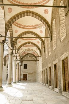 Colonnade at the Blue Mosque, Sultan Ahmet Camii Mosque, Istanbul, Turkey.