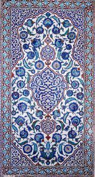 Beautiful Iznik tiles decorating the exterior of the tomb of Sultan Murad II constructed in 1599 and still on public display in the old city of Istanbul, Turkey.