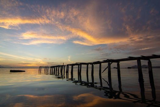 Wooden bridge on sea at Jelutong, Penang in beautiful dawn hour.