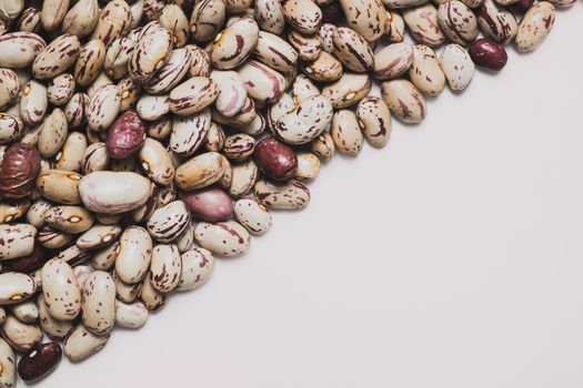 Heap of beans on clean background. Healthy eating, protein diet concept.