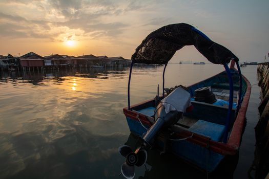 Fisherman boat park near Clan Jetty heritage house at Penang Georgetown.