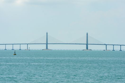 Main Span Stayed Cable of Penang Bridge, Malaysia in blue weather.