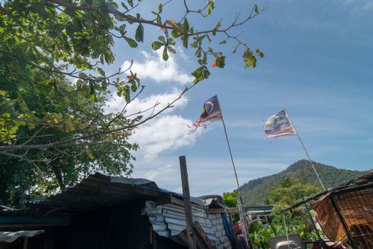 Two fade Malaysia flag waving.