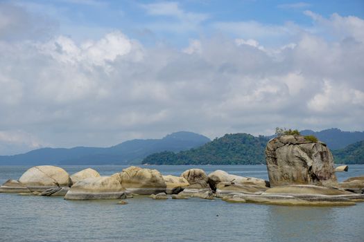 Rock formation on the beach in Permatang Damar Laut, Penang.