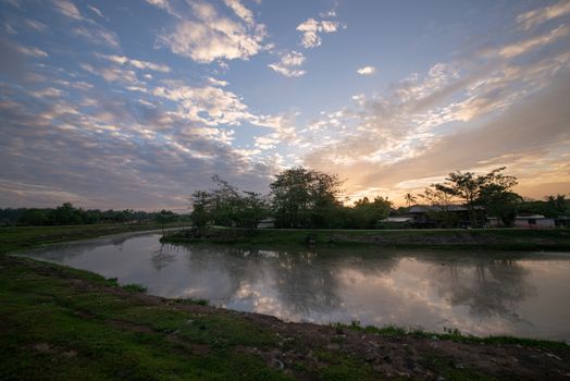 Malays village beside river in early morning at Malaysia.