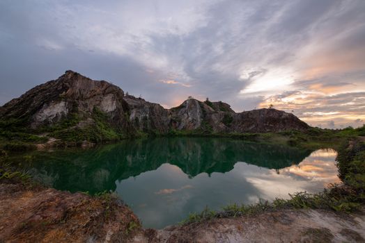 Panoramic scenery with turquoise green lake and hill at Frog Hill, Penang.