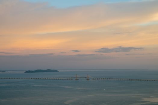 Aerial view Penang Bridge in sunset evening.