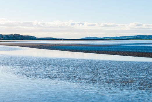 Estuary with Arnside viaduct in background Sandside, Cumbria UK