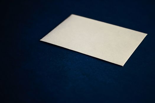 Blank beige paper card on blue background, premium business and luxury brand identity mockup