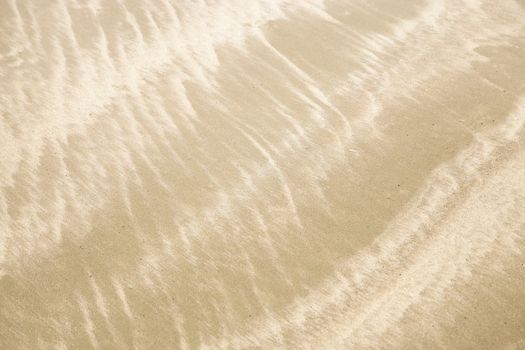 Abstract background of sand pattern on the beach