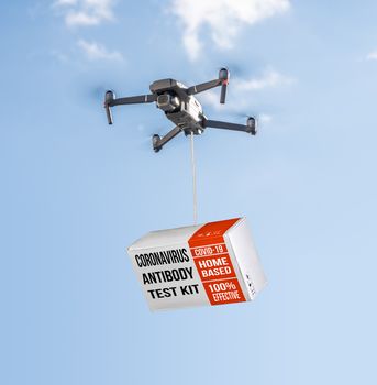 Flying drone delivering a covid-19 immunity antibody test kit against blue sky during coronavirus epidemic