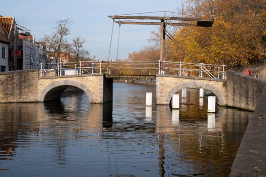 Old bridge crossing the canals of Bruges, Belgium