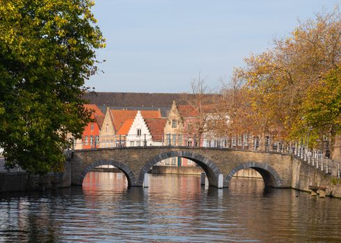 Old bridge crossing the canals of Bruges, Belgium