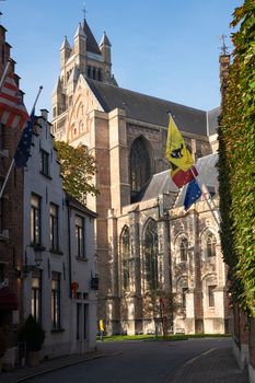 Street onto the cathedral, historic city of Bruges, Belgium