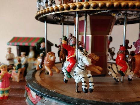 Round-round merry go round carousal sculpture and doll set miniature