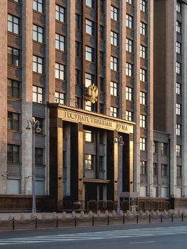 Building of State Duma of Russia inscribed - State Parliament . Deserted Okhotny Ryad street. Moscow, Russia.