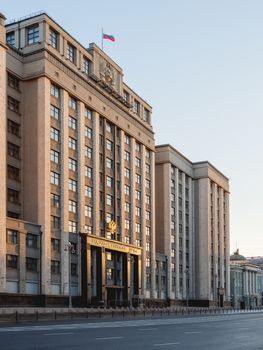Building of State Duma of Russia inscribed - State Parliament . Deserted Okhotny Ryad street. Moscow, Russia.