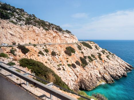 Mountain serpentine road along Mediterranean sea. Demre Finike Yolu road . Turkey.