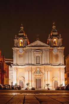 Illuminated Metropolitan Cathedral of Saint Paul, commonly known as St Paul's Cathedral or the Mdina Cathedral. Night view on Roman Catholic cathedral in Mdina, Malta.