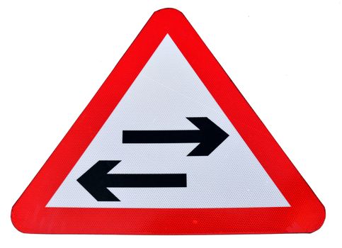 An isolated triangular traffic sign to indicate a two way tram line featuring right and left arrows