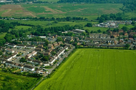 View from a plane of part of the village of Colnbrook, Berkshire on a sunny morning in June.