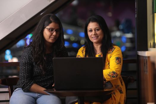 Female Employs with Computer in a office
